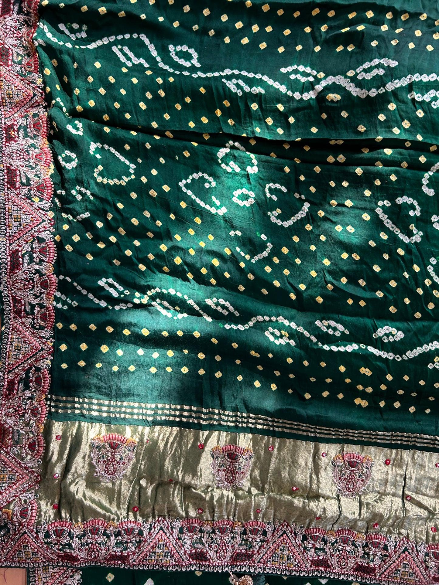 Dark Green Modal silk Bandhini saree with embroidered Border