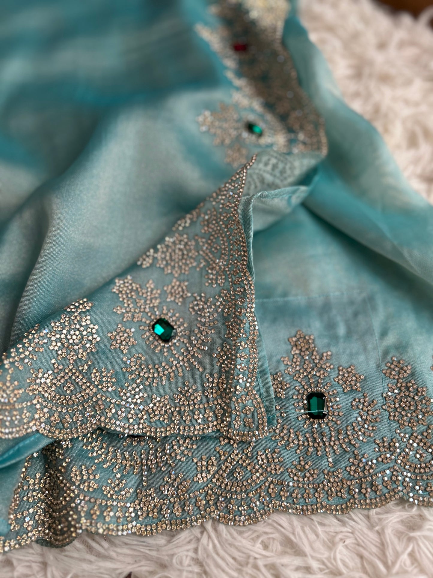Pastel Blue Tissue Saree with stitched Blouse