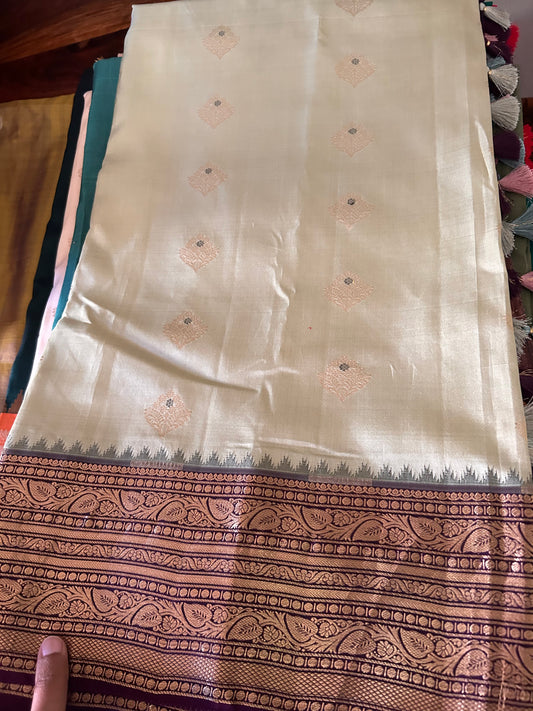 Creme Kanchipuram Saree with Purple Border