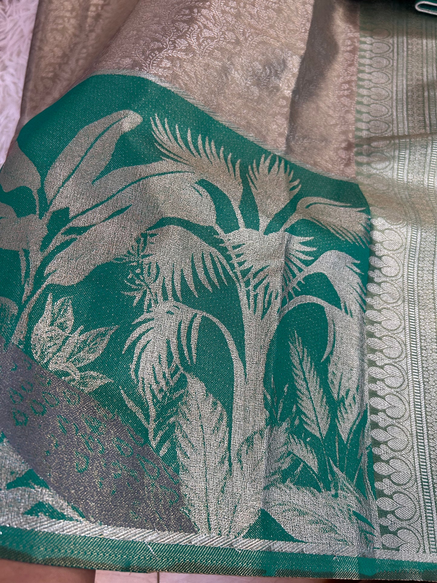 Designer Tissue Banarasi Saree in Silver with Seagreen Border