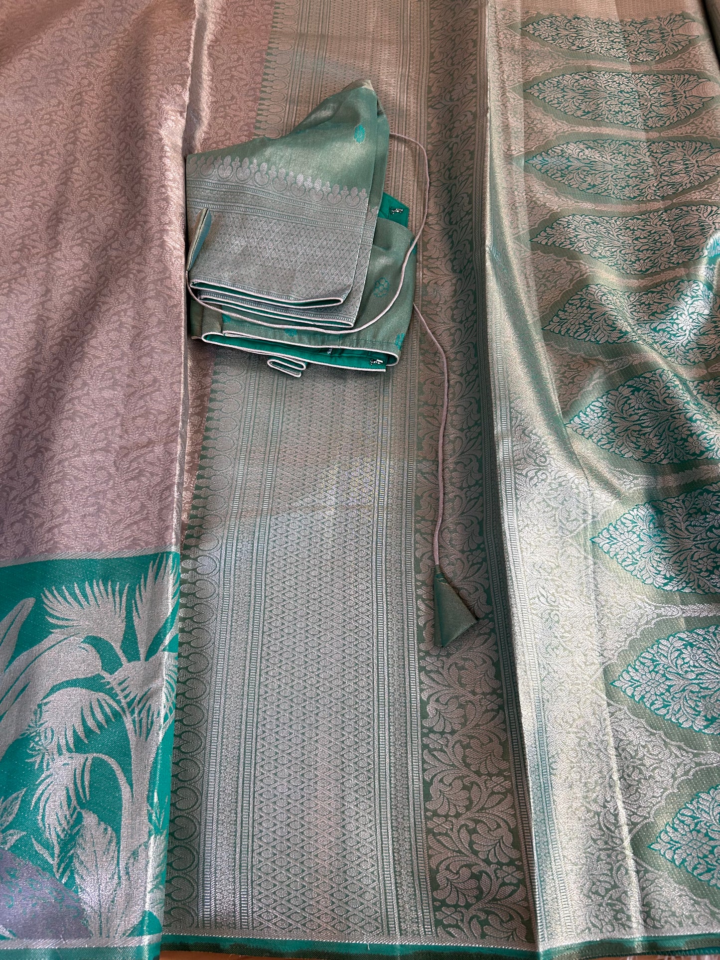 Designer Tissue Banarasi Saree in Silver with Seagreen Border