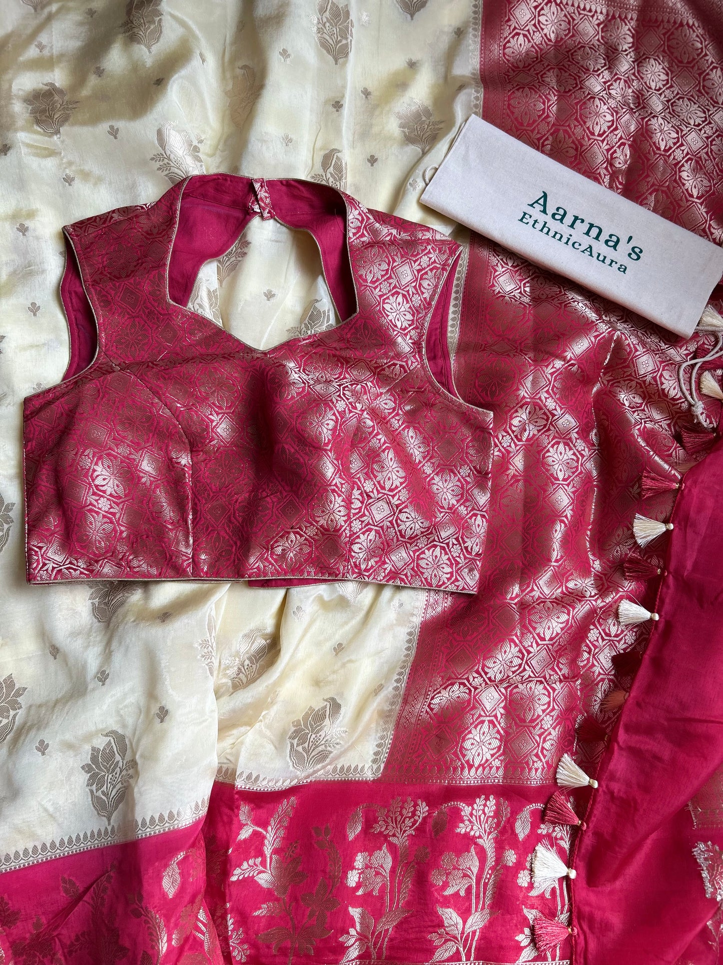Organza Chiffon Saree in creme with Pink Border