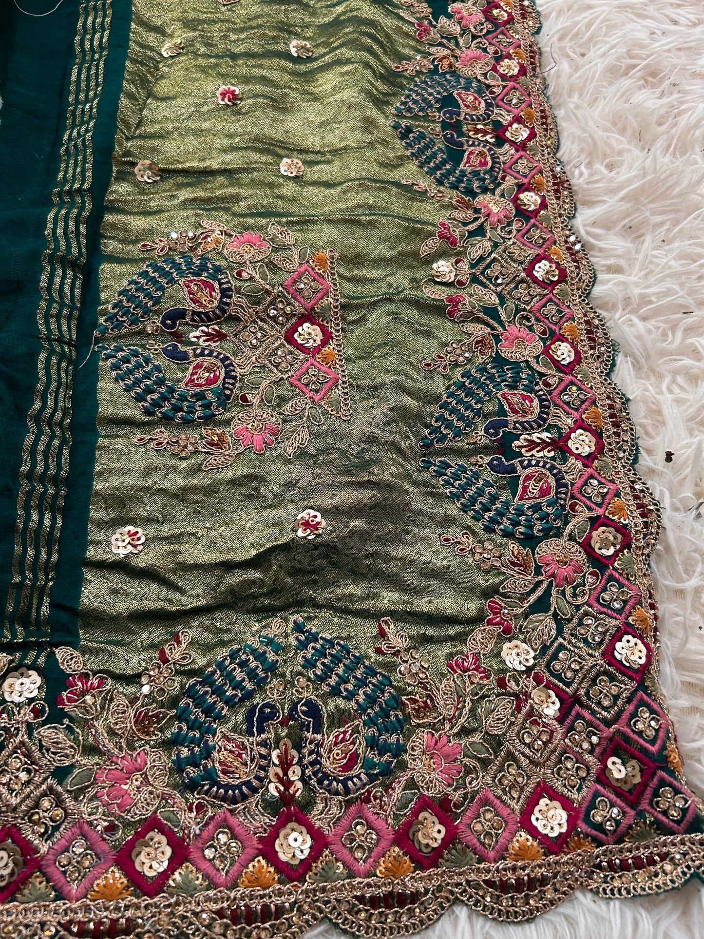 Peacock green Modal silk Bandhini Saree with Embroidered border