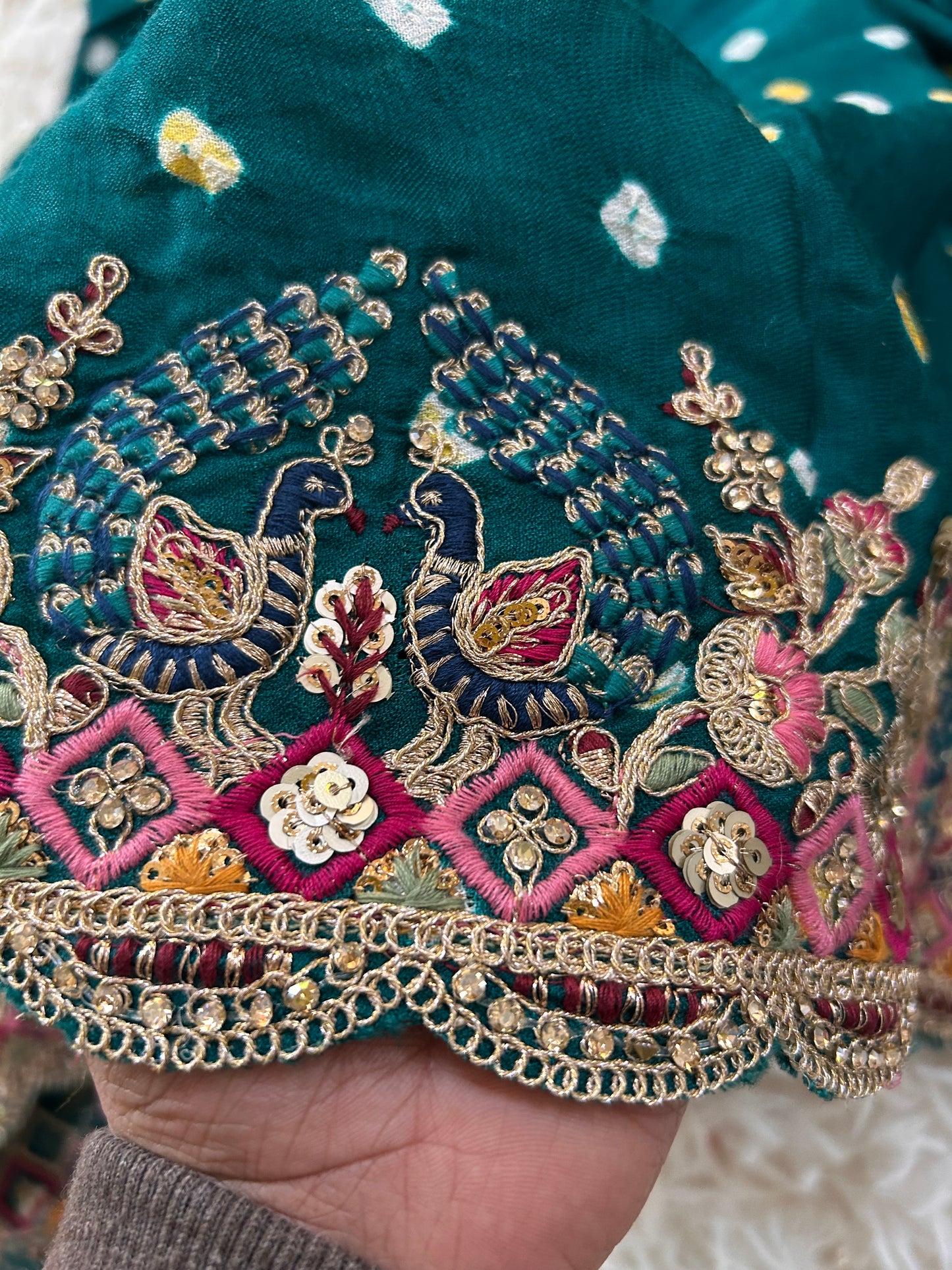 Peacock green Modal silk Bandhini Saree with Embroidered border