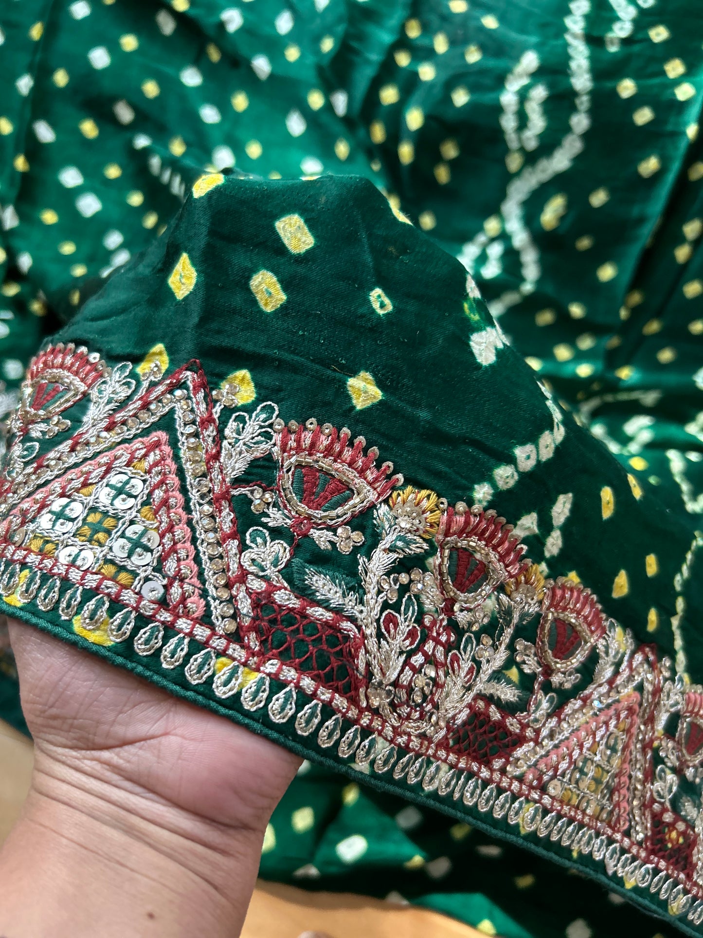 Dark Green Modal silk Bandhini saree with embroidered Border