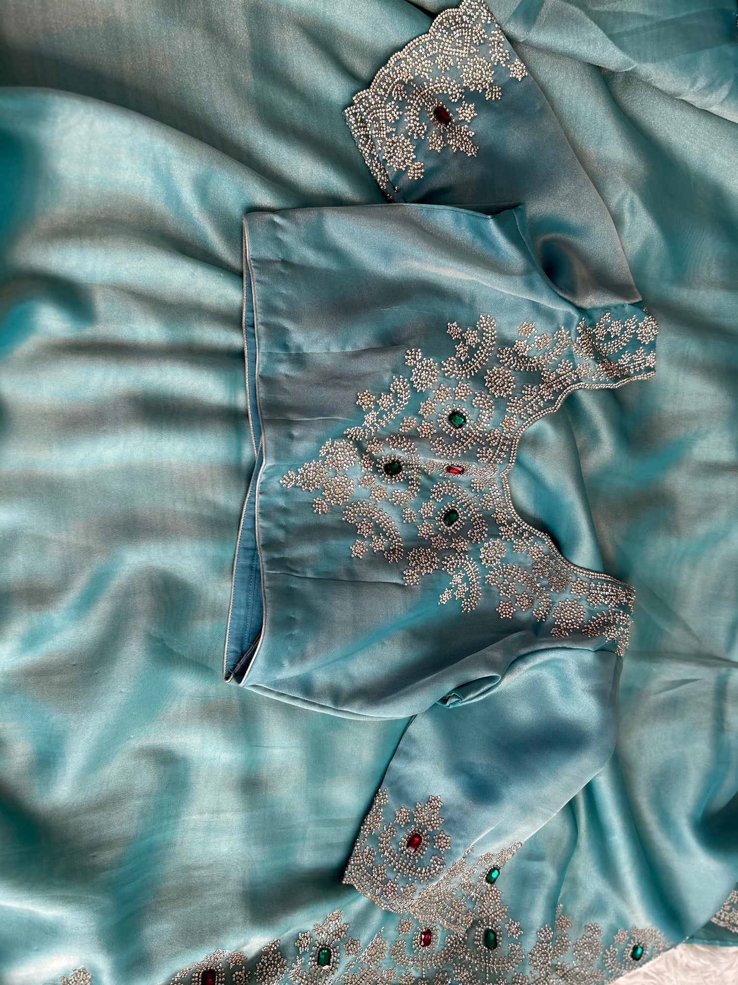 Pastel Blue Tissue Saree with stitched Blouse
