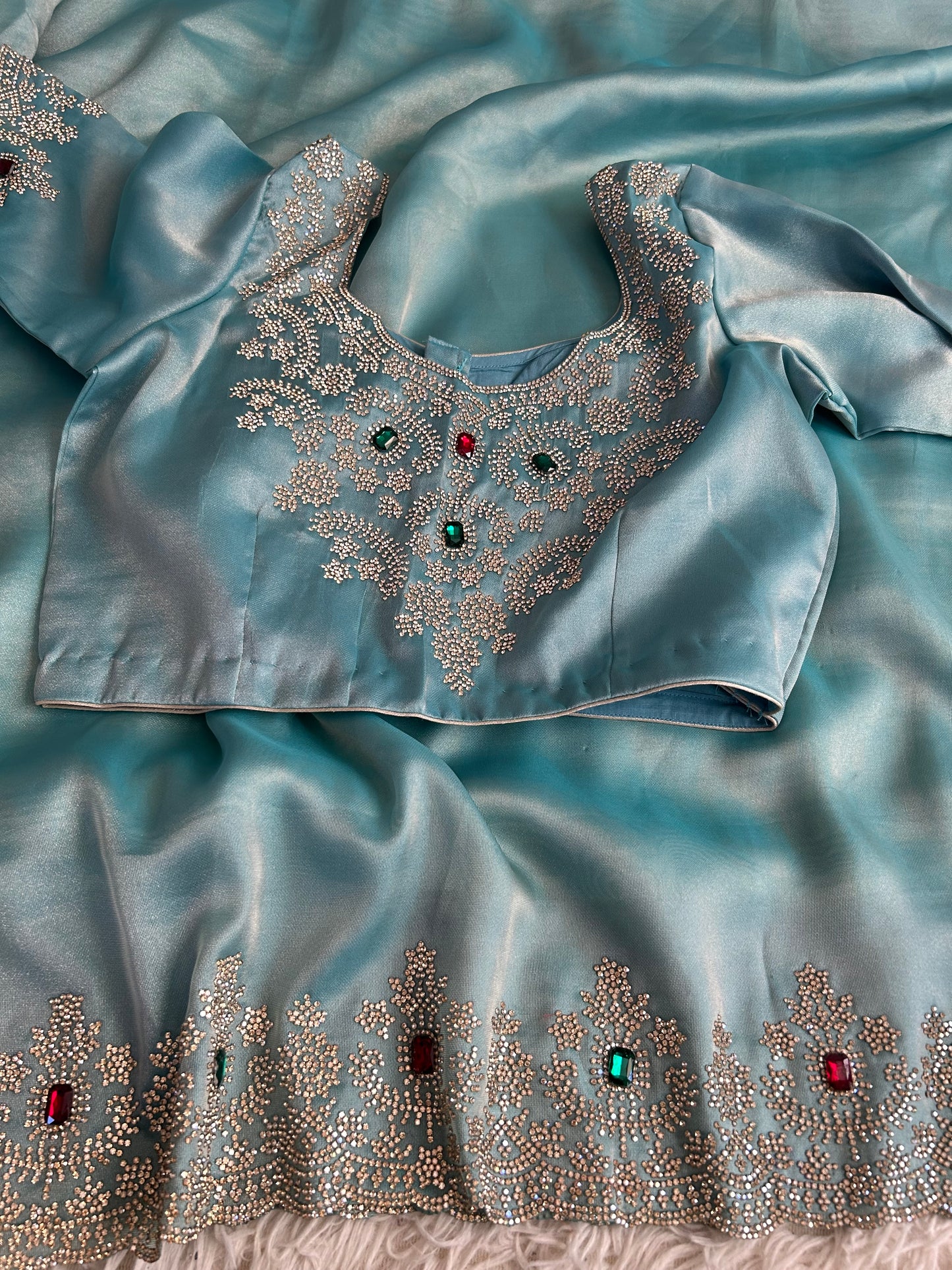 Pastel Blue Tissue Saree with stitched Blouse